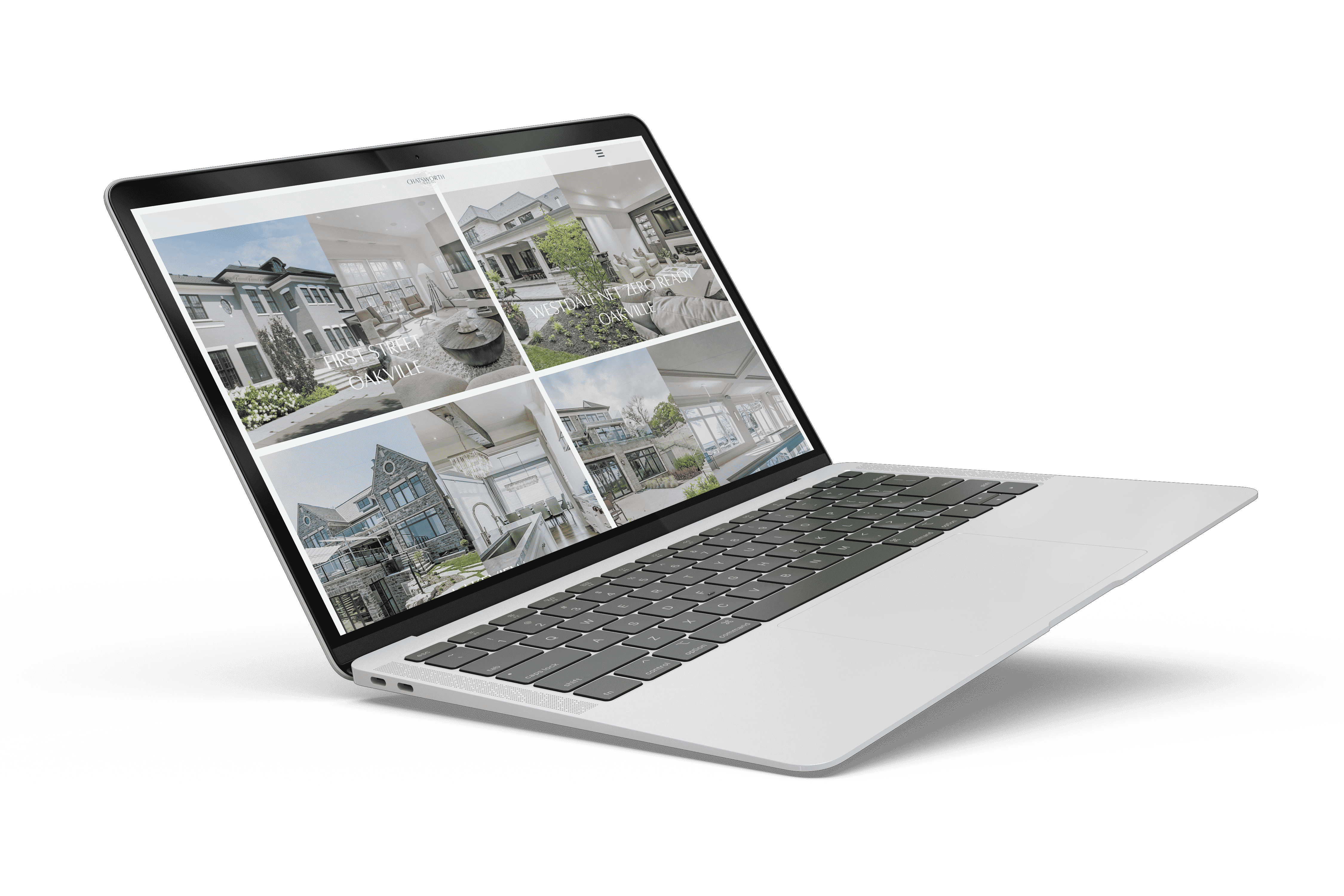 A laptop with pictures of houses on it.