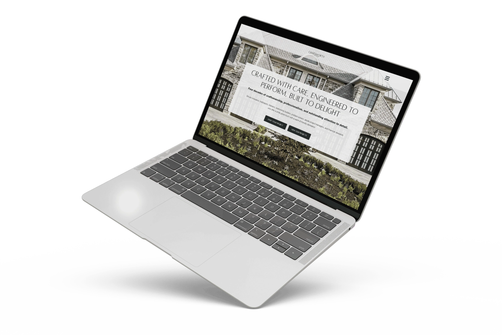 A laptop computer displaying the Portfolio of Chatsworth Fine Homes website.