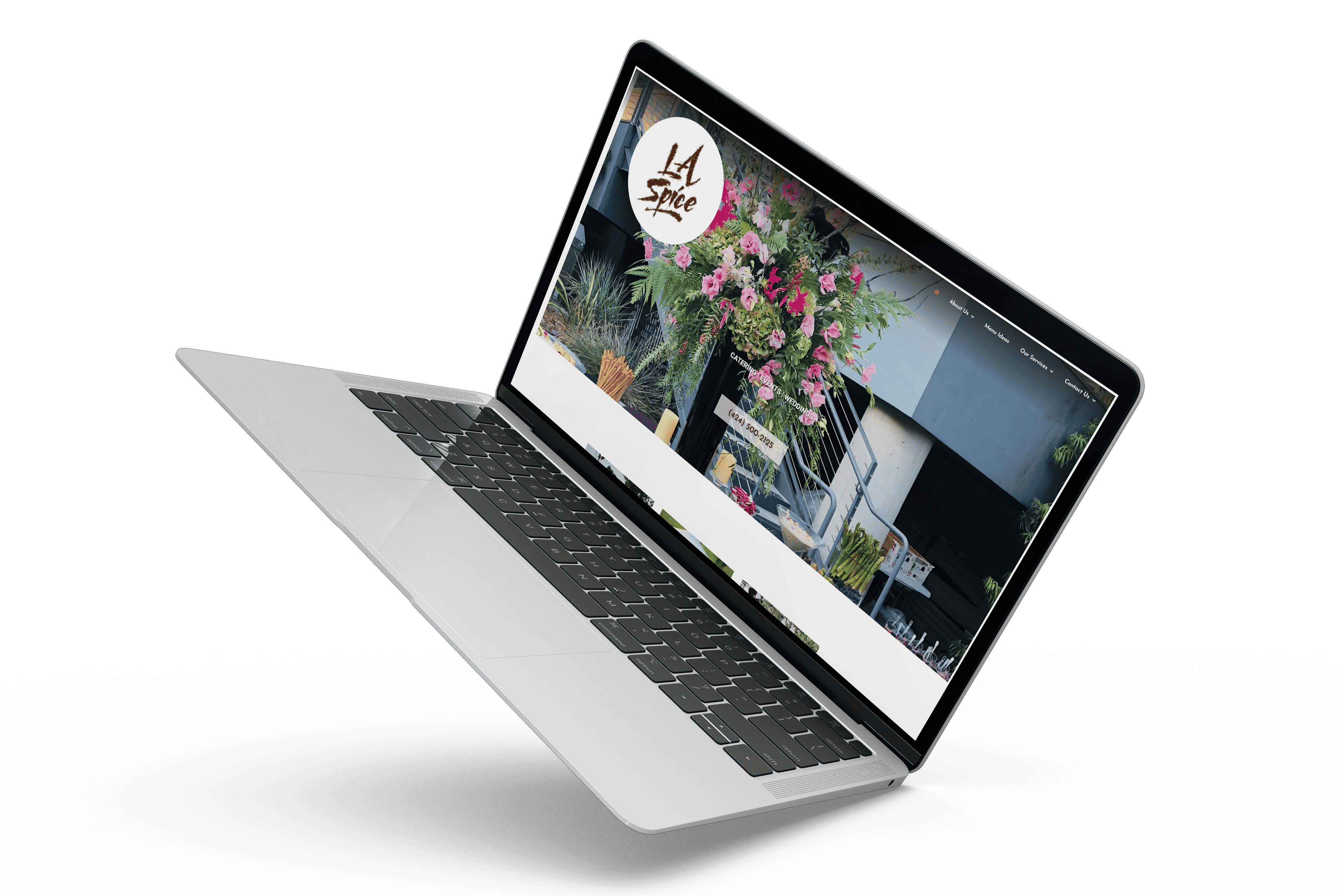 An image of a laptop with flowers on it.