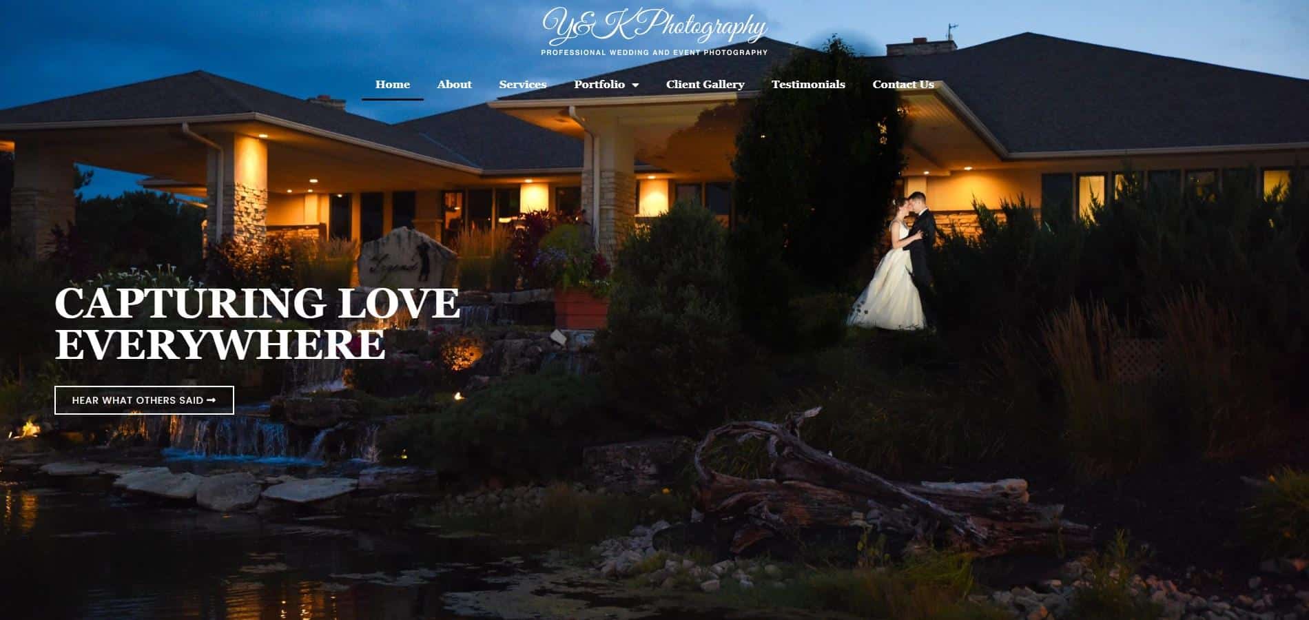 A wedding website with a bride and groom in front of a lake.