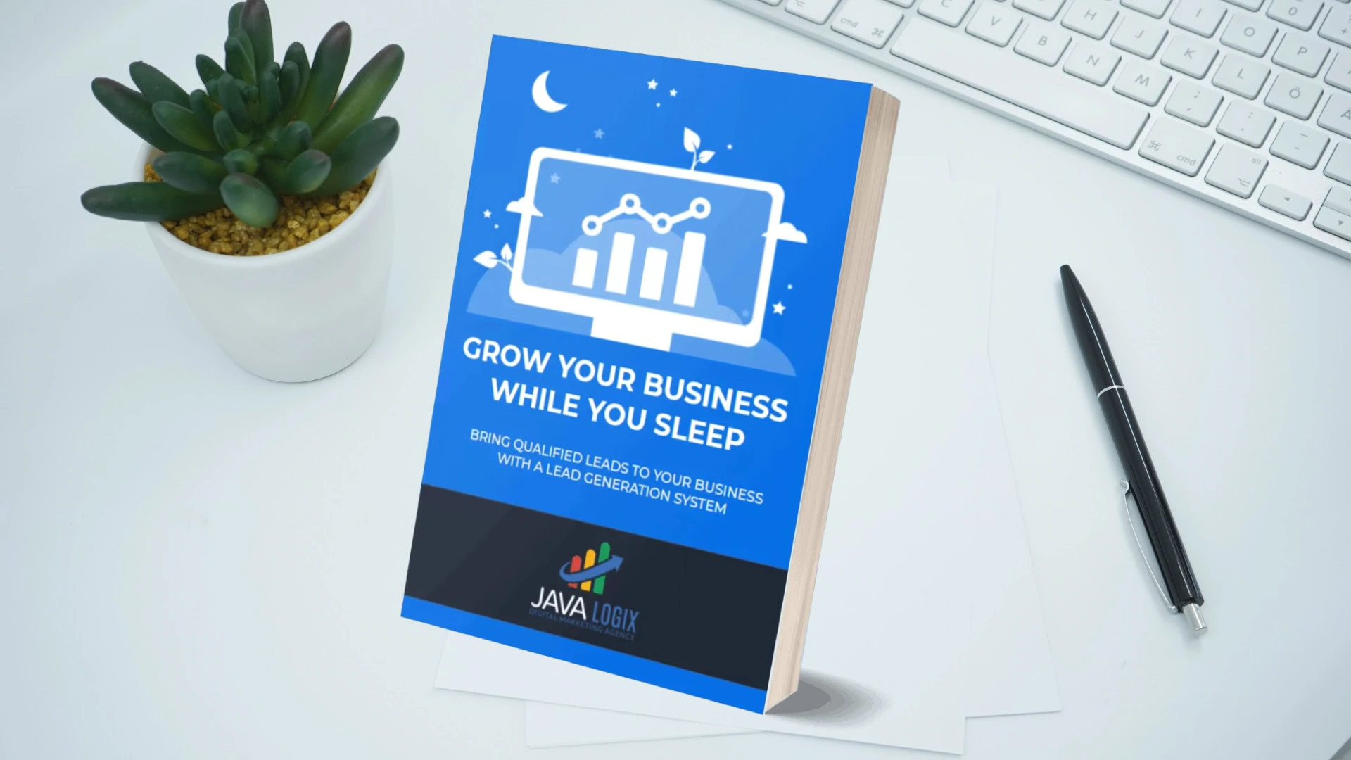 A book titled "Grow Your Business While You Sleep" sits on a desk next to a pen, papers, a keyboard, a small potted plant, and a sleek digital marketing portfolio.